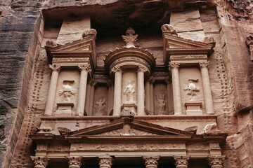 Fototapeta na wymiar The Treasury tomb carved in stone, at the famous archaeological site Petra in Jordan.