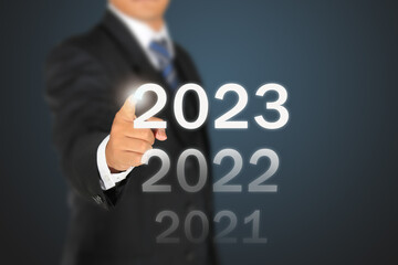 business man signing 2023 
