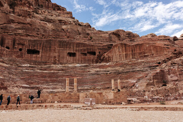 Roman amphitheatre carved into the mountain in the ancient city of Petra in Jordan