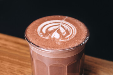 Cup of hot chocolate on cup holder