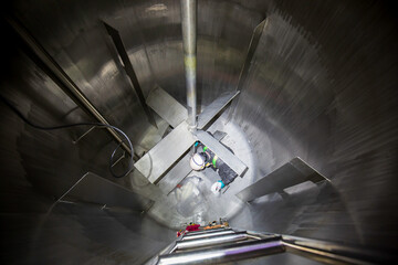 Male into work inspection process chemical into oil storage tank confined space © chitsanupong