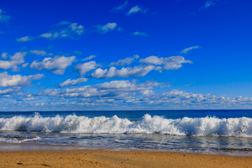 Blue sea and sandy beach in Japan on a sunny day