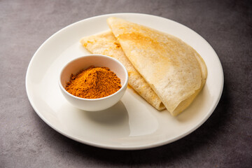 Podi Dosa or dosai is a south indian spicy and delicious recipe with idli milagai podi or gunpowder