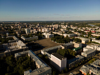 Cars riding along asphalt road