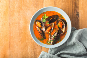 Sauté with mussels in a sauce with tomatoes, white wine, herbs and parsley served with rye integral bread. Taste of France, Italy and northern Spain. Mediterranean Recipes, copy space