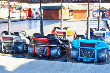 Obraz premium Toy cars on children attraction at fair
