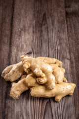 Organic fresh ginger root on the table.