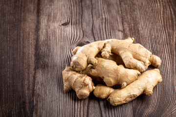 Organic fresh ginger root on the table.