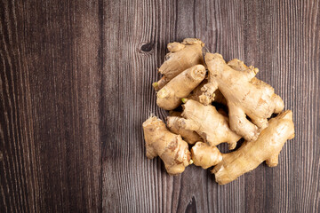 Organic fresh ginger root on the table.
