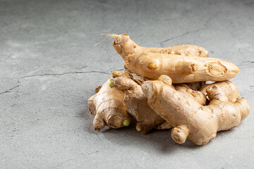 Organic fresh ginger root on the table.