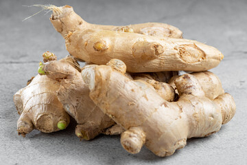 Organic fresh ginger root on the table.