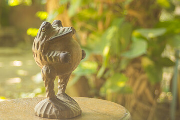 close up frog sculptured wood