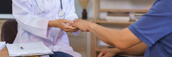 Health concept, Woman caregiver touch hand to encourage senior man after telling result of health