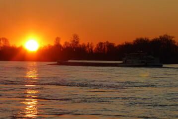 Sunset in Dusseldorf Kaiserswerth on the Rhine with a Ship Germany