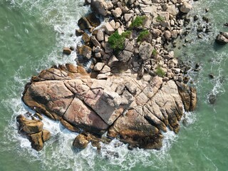 View from the throne from above on a beautiful stone island in the sea
