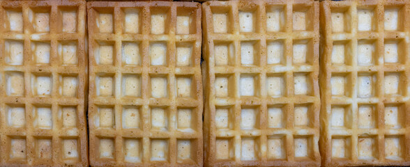 lined up waffles, typical belgian dessert, background
