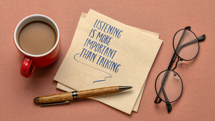 listening is more important than talking - inspirational advice or reminder on a napkin with coffee, communication concept