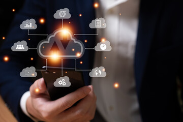 Selective focus at the icon with hand of businessman that holding cloud icon while who using internet and personal cloud storage to keep information and payment data, upload over the internet.