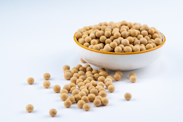 Pile of soybean on white surface