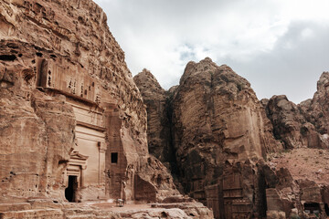 Stone tombs carved into the mountain in the ancient city of Petra in Jordan