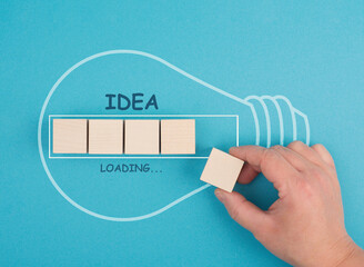 Idea loading, progress bar with a light bulb, starting a new business, development and growth...