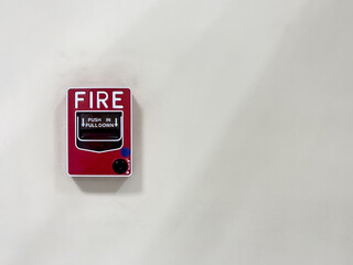 The fire alarm is mounted on the wall. to be used as a warning signal when there is a fire
