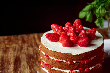 Victoria sponge cake with cream and strawberry