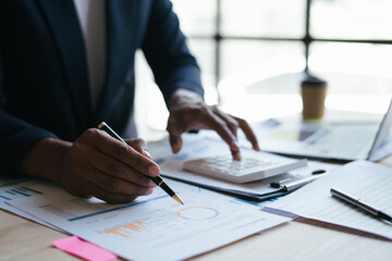 Meeting concept Business team hands at working with financial plan, meeting, discussion, brainstorm with tablet on the office desk,