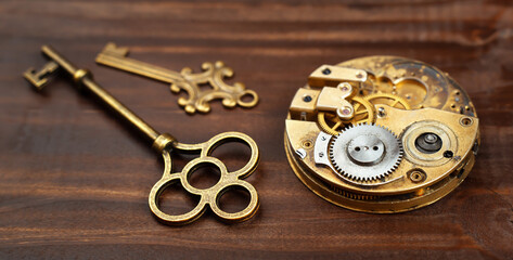 Old gold vintage keys with antique clockwork, escape room game banner
