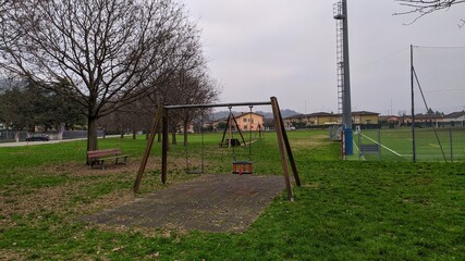 Fototapeta na wymiar empty outdoor playground in winter 
