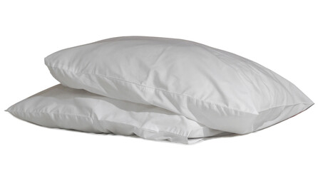 Two white pillows with cases after guest's use at hotel or resort room isolated on white background...