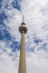 Berlin, Germany - June 29, 2022: The TV Tower or Fernsehturm at the Alexanderplatz, former city center of east berlin. Fernsehturm is the highest or tallest building in Germany. Icon of Berlin skyline