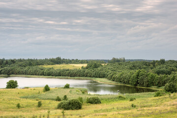 Fototapeta na wymiar Serene landscape with a lake