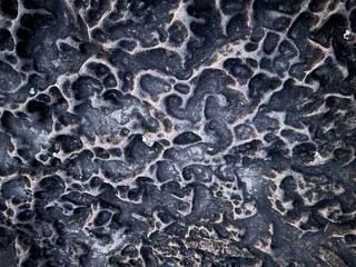 A background image formed from centuries-old rocks that have been eroded.