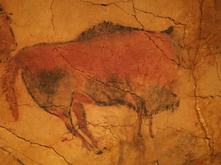 Prehistoric polychrome Magdalenian bison in Altamira cave in Spain