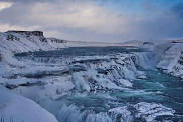 winter in the mountains with waterfall