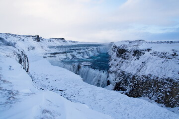 winter mountain landscape with waterfall