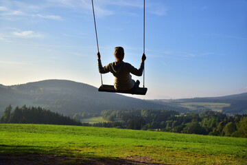 The world on a swing.The world on a swing, grandpa on a swing in Orlické hory