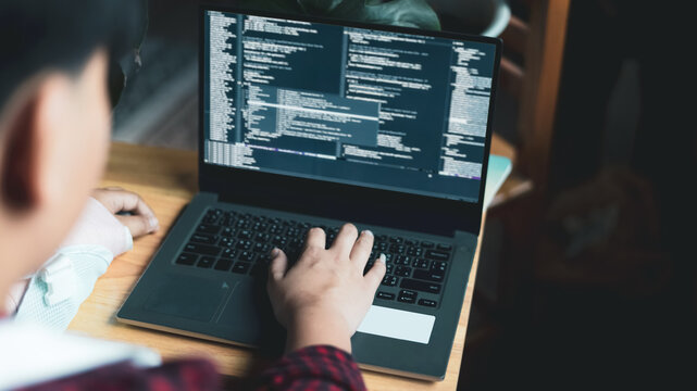 programmer writes coding digital world technology. Visualize programming and analysts worker with code Website design Safety of the social world Cyberspace concept. working from home. Selective focus