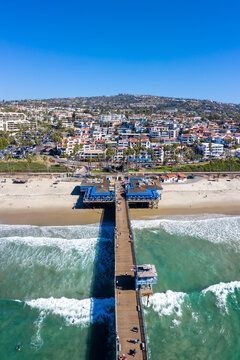 Aerial view of San Clemente California with pier and beach sea vacation portrait format in the United States