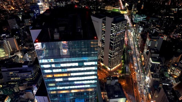 TOKYO - OCT 3rd, 2022: Aerial view of traffic through Shibuya, Tokyo, Japan at night
