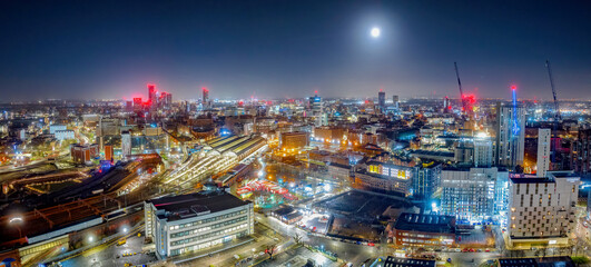 Picadilly train station Manchester City Centre and construction and redevelopment work at dawn with...