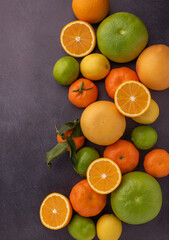 Citrus background with limes, lemons, grapefruits and oranges