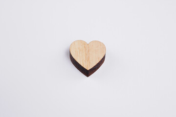 wooden valentines heart on white background