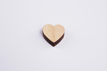 wooden valentines heart on white background