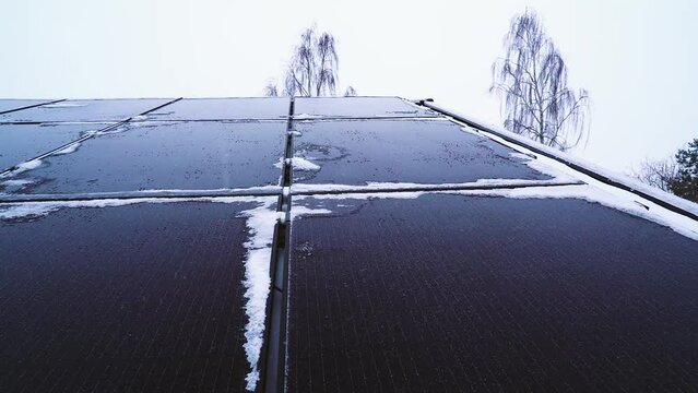 Snow drifting over solar panels