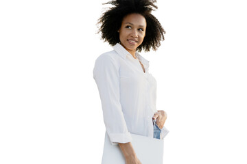 A curly-haired woman in a white shirt, holding a laptop, isolated transparent background.