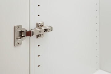 metal hinge on cabinet doors