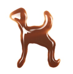Spilled chocolate milk puddle in shape letter K isolated on white background, top view