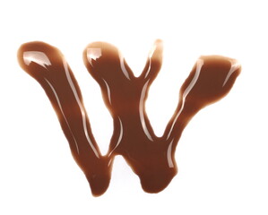 Spilled chocolate milk puddle in shape letter W isolated on white background, top view